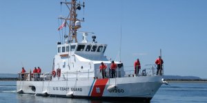 The U.S. Coast Guard rescues a man from disabled sailing vessel