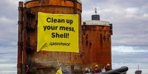 Greenpeace activists protest “hazardous oily sludge” in North Sea